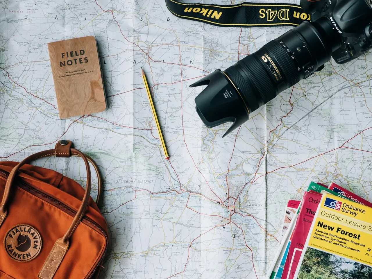 Map and notebook used to plan a trip